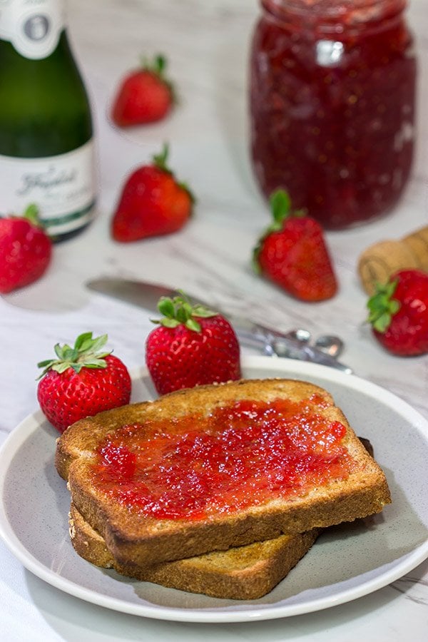Strawberries and champagne are a classic combination...but have you ever had them for breakfast?  Grab some berries and bubbly and make a batch of this Strawberry Champagne Jam today!