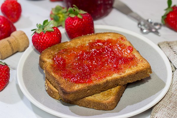 Strawberries and champagne are a classic combination...but have you ever had them for breakfast?  Grab some berries and bubbly and make a batch of this Strawberry Champagne Jam today!
