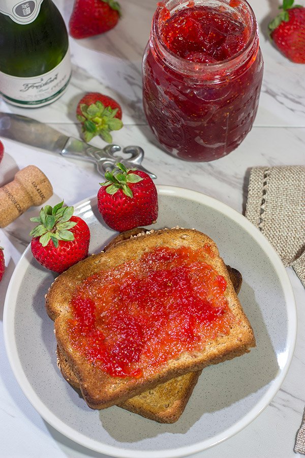 Strawberries and champagne are a classic combination...but have you ever had them for breakfast?  Grab some berries and bubbly and make a batch of this Strawberry Champagne Jam today!