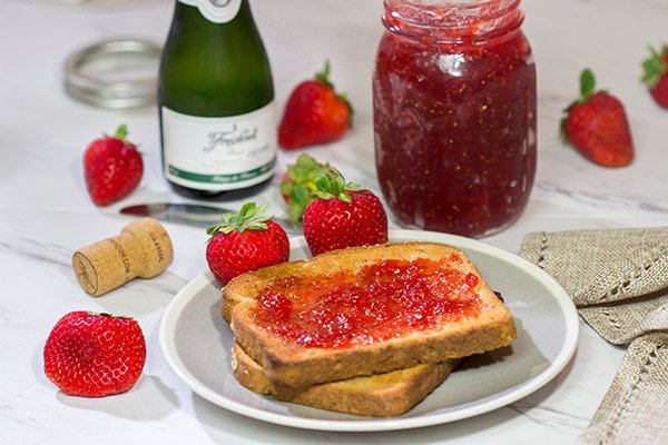 Strawberries and champagne are a classic combination...but have you ever had them for breakfast?  Grab some berries and bubbly and make a batch of this Strawberry Champagne Jam today!
