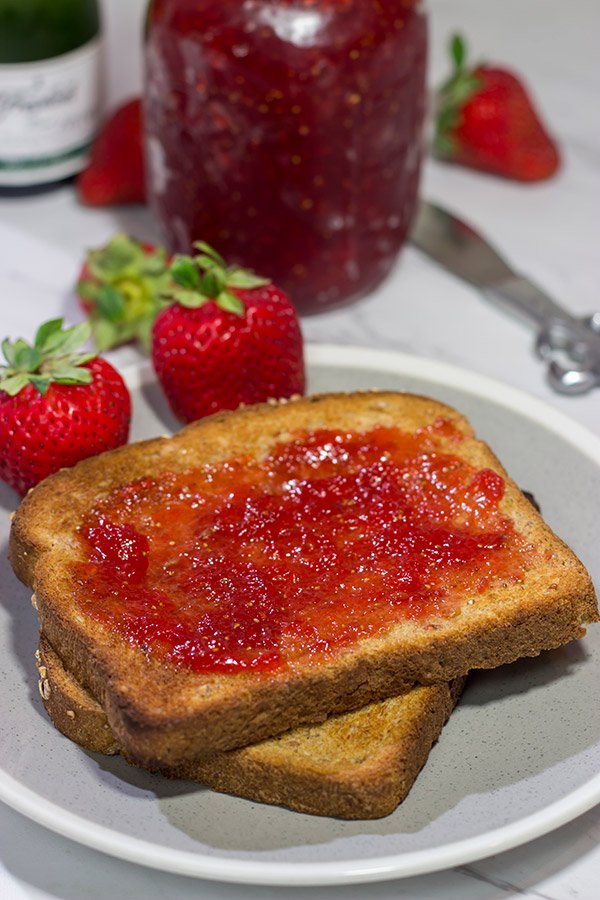 Strawberries and champagne are a classic combination...but have you ever had them for breakfast?  Grab some berries and bubbly and make a batch of this Strawberry Champagne Jam today!