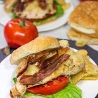 Fire up that grill!  Starting with an easy + flavorful marinade, these Bacon & Cheese Grilled Chicken Sandwiches are a delicious way to enjoy dinner outdoors!