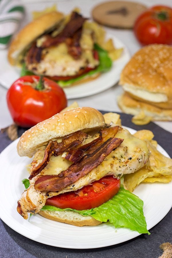 Fire up that grill!  Starting with an easy + flavorful marinade, these Bacon & Cheese Grilled Chicken Sandwiches are a delicious way to enjoy dinner outdoors!