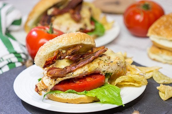 Fire up that grill!  Starting with an easy + flavorful marinade, these Bacon & Cheese Grilled Chicken Sandwiches are a delicious way to enjoy dinner outdoors!