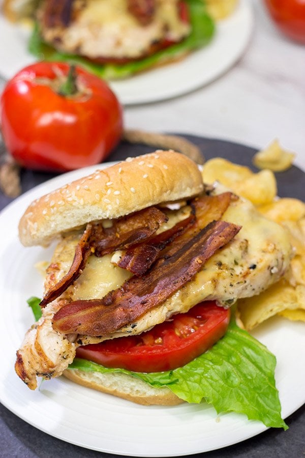 Fire up that grill!  Starting with an easy + flavorful marinade, these Bacon & Cheese Grilled Chicken Sandwiches are a delicious way to enjoy dinner outdoors!