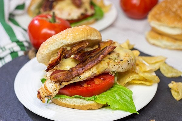 Fire up that grill!  Starting with an easy + flavorful marinade, these Bacon & Cheese Grilled Chicken Sandwiches are a delicious way to enjoy dinner outdoors!
