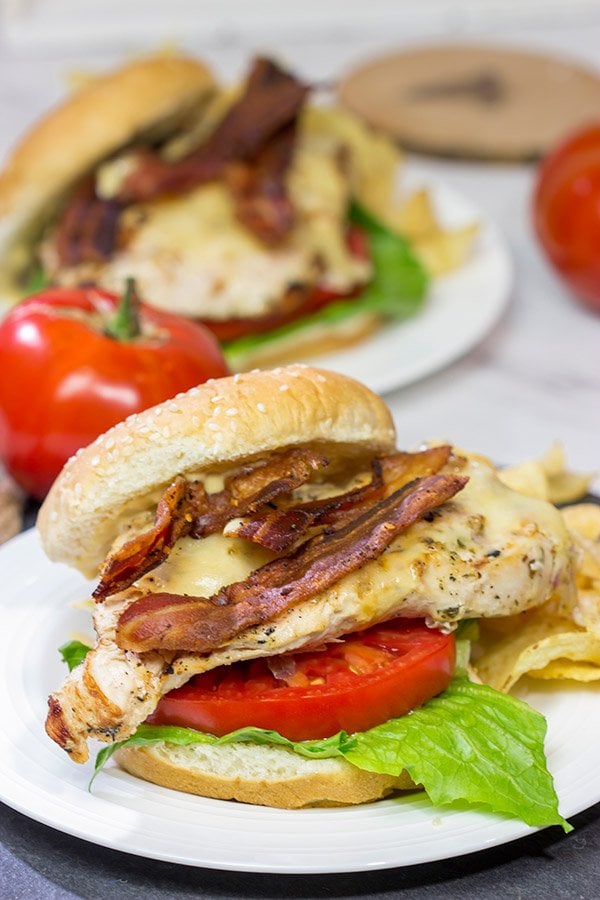 Fire up that grill!  Starting with an easy + flavorful marinade, these Bacon & Cheese Grilled Chicken Sandwiches are a delicious way to enjoy dinner outdoors!