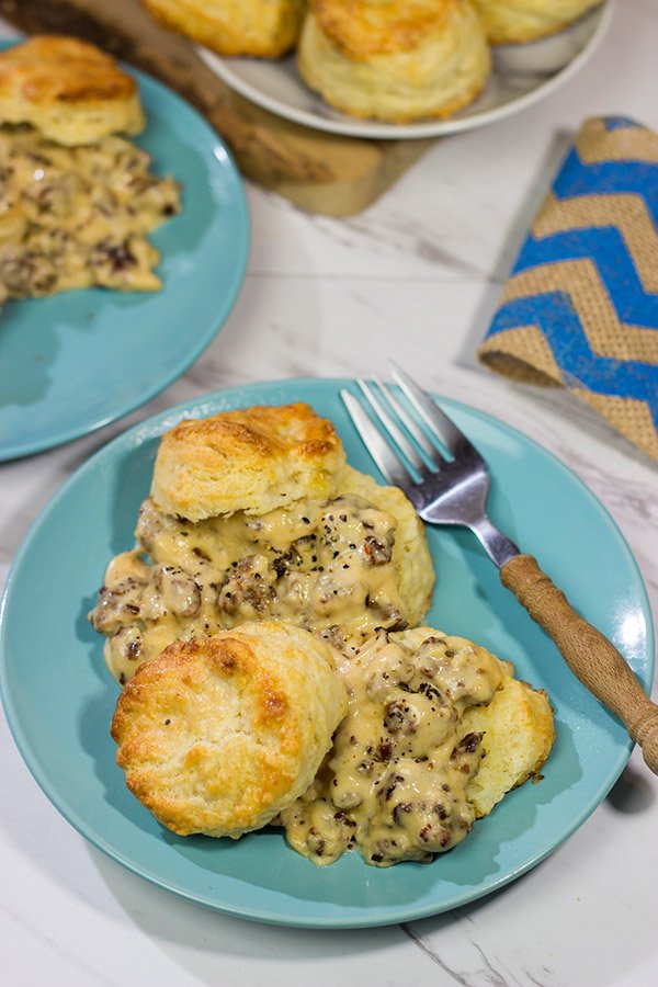 Homemade Buttermilk Biscuits and Sausage Gravy are an iconic Southern comfort food.  Whip up a batch for brunch this weekend!