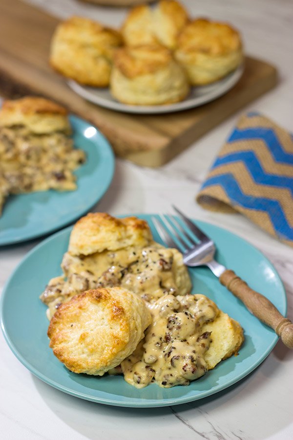 Homemade Buttermilk Biscuits and Sausage Gravy are an iconic Southern comfort food.  Whip up a batch for brunch this weekend!
