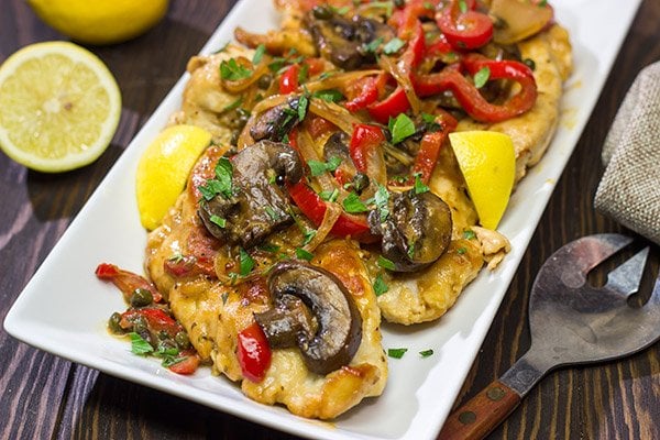 Chicken Scallopini might sound fancy, but it's actually an easy recipe. Think thinly-sliced chicken sauteed with onions, peppers and mushrooms and then tossed in a white wine lemon sauce. It's delicious!