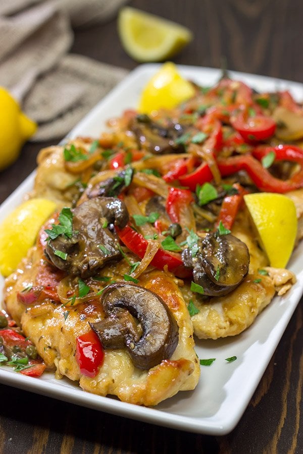 Chicken Scallopini might sound fancy, but it's actually an easy recipe. Think thinly-sliced chicken sauteed with onions, peppers and mushrooms and then tossed in a white wine lemon sauce. It's delicious!