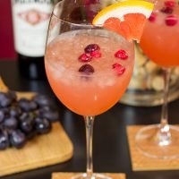 Give your glass of wine an Autumn feel with this Cranberry Grapefruit Wine Spritzer. It's a tasty way to welcome in sweater season!