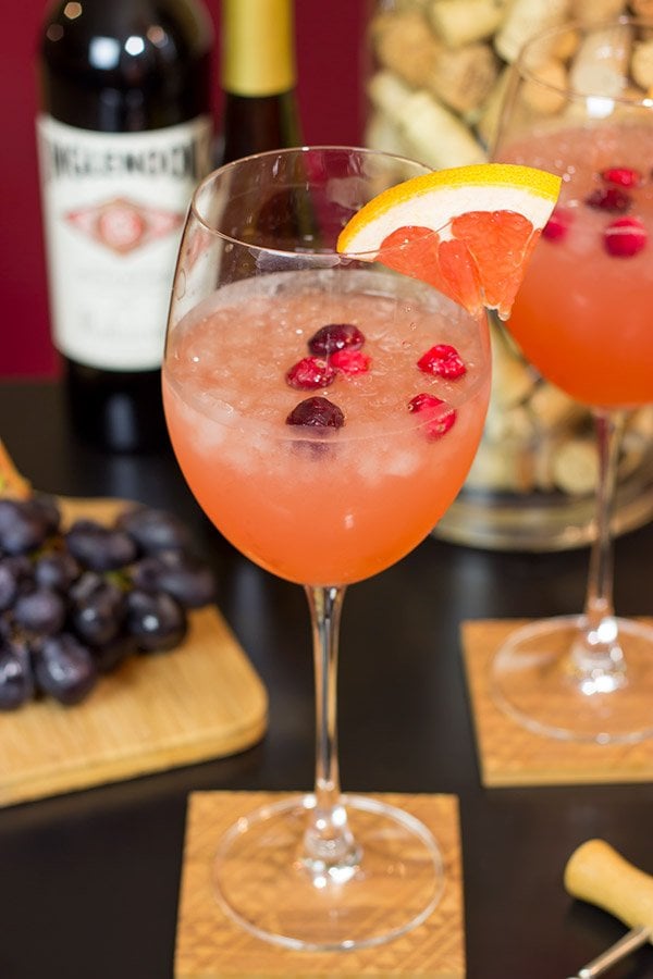 Give your glass of wine an Autumn feel with this Cranberry Grapefruit Wine Spritzer.  It's a tasty way to welcome in sweater season!