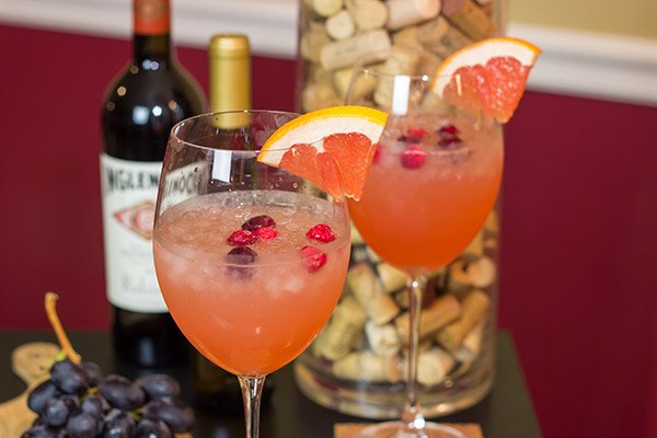 Give your glass of wine an Autumn feel with this Cranberry Grapefruit Wine Spritzer.  It's a tasty way to welcome in sweater season!