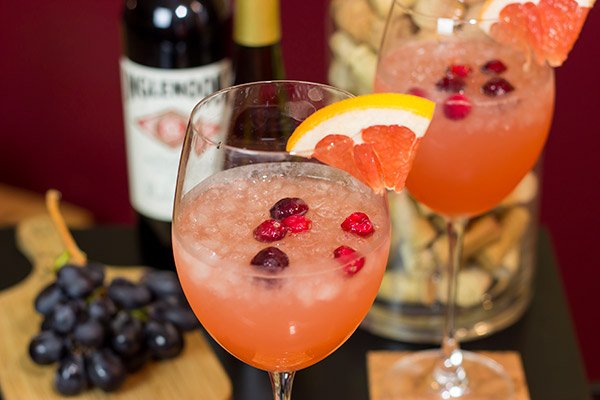 Give your glass of wine an Autumn feel with this Cranberry Grapefruit Wine Spritzer.  It's a tasty way to welcome in sweater season!