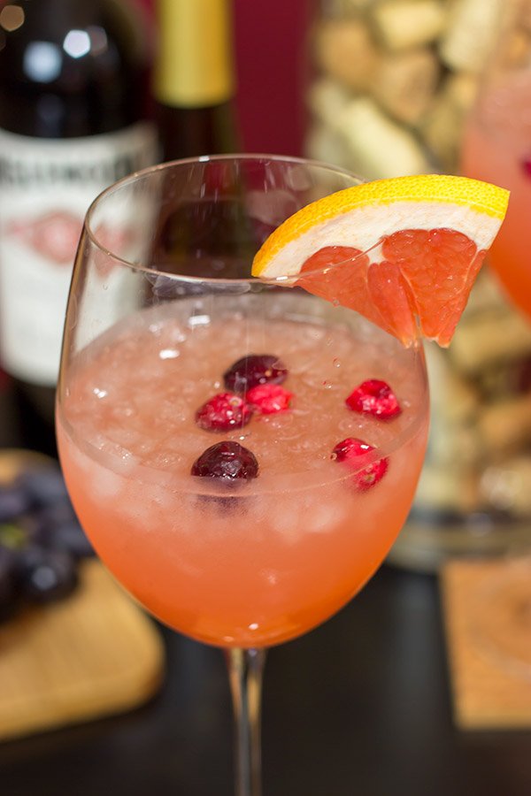 Give your glass of wine an Autumn feel with this Cranberry Grapefruit Wine Spritzer.  It's a tasty way to welcome in sweater season!