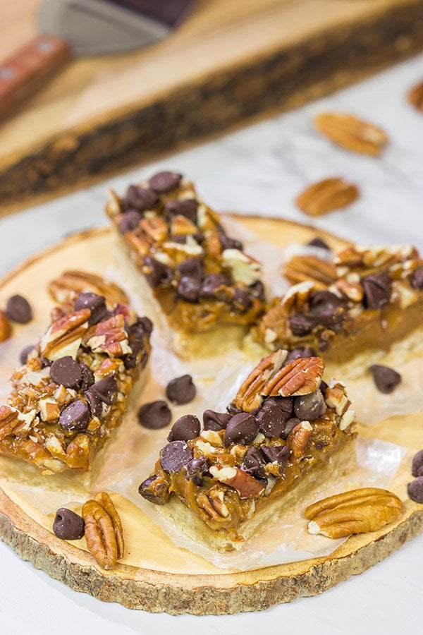 These Dulce de Leche Turtle Cookie Bars feature a shortbread cookie crust topped with dulce de leche, pecans and chocolate chips.  Yum!