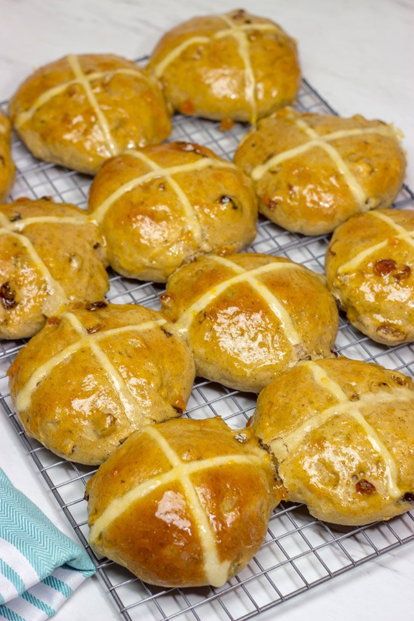 Heavily flavored with traditional baking spices, citrus zest and raisins, these Hot Cross Buns are a delicious way to start the morning!
