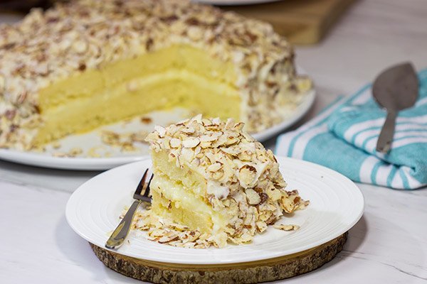 Looking for a unique cake idea?  This Burnt Almond Torte is filled with vanilla pastry cream...oh yeah, and it's smothered in sugared almonds.  Talk about a delicious sweet treat!