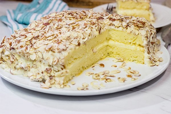 Looking for a unique cake idea?  This Burnt Almond Torte is filled with vanilla pastry cream...oh yeah, and it's smothered in sugared almonds.  Talk about a delicious sweet treat!