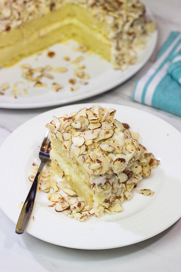 Looking for a unique cake idea?  This Burnt Almond Torte is filled with vanilla pastry cream...oh yeah, and it's smothered in sugared almonds.  Talk about a delicious sweet treat!