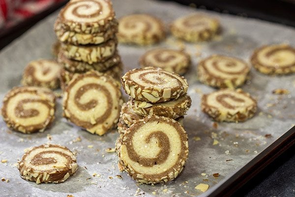 These Chocolate Almond Sugar Cookies have something for everyone!  These swirled chocolate and vanilla cookies get rolled in chopped almonds before going into the oven.  Yum!