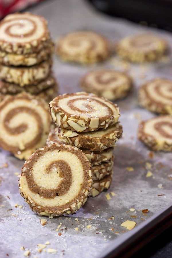These Chocolate Almond Sugar Cookies have something for everyone!  These swirled chocolate and vanilla cookies get rolled in chopped almonds before going into the oven.  Yum!