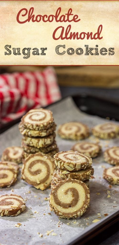 These Chocolate Almond Sugar Cookies have something for everyone! These swirled chocolate and vanilla cookies get rolled in chopped almonds before going into the oven. Yum!