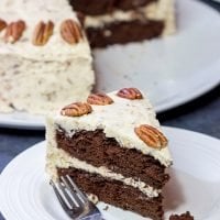 Craving a good slice of cake? Then pull out the pecans and make this Chocolate Pecan Cake! This is a moist chocolate cake covered with pecan frosting...and it's delicious!