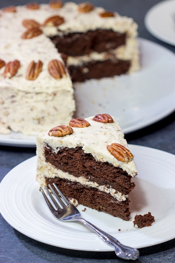 Craving a good slice of cake?  Then pull out the pecans and make this Chocolate Pecan Cake!  This is a moist chocolate cake covered with pecan frosting...and it's delicious!