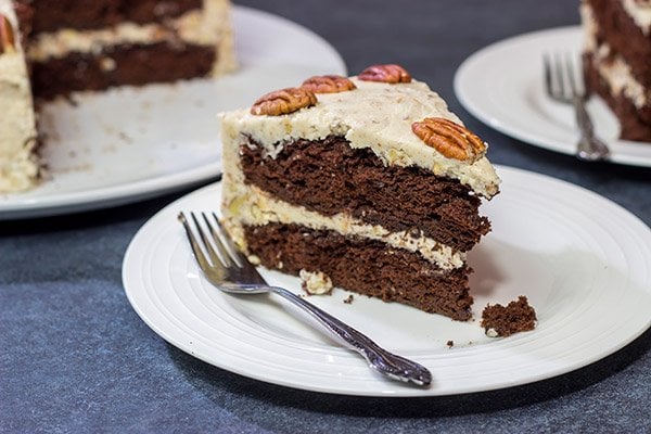 Craving a good slice of cake?  Then pull out the pecans and make this Chocolate Pecan Cake!  This is a moist chocolate cake covered with pecan frosting...and it's delicious!