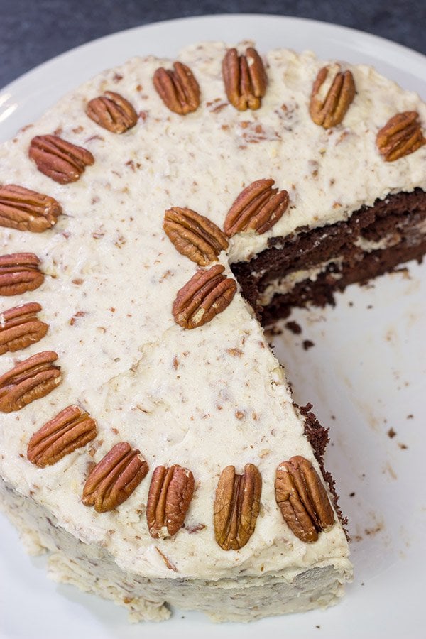 Craving a good slice of cake?  Then pull out the pecans and make this Chocolate Pecan Cake!  This is a moist chocolate cake covered with pecan frosting...and it's delicious!