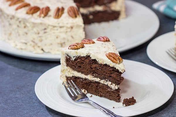 Craving a good slice of cake?  Then pull out the pecans and make this Chocolate Pecan Cake!  This is a moist chocolate cake covered with pecan frosting...and it's delicious!