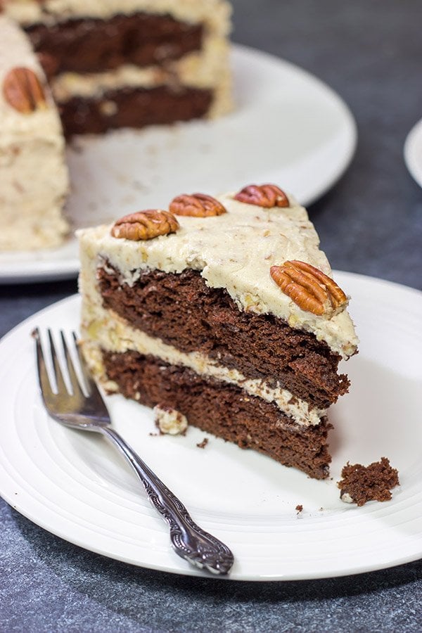 Craving a good slice of cake?  Then pull out the pecans and make this Chocolate Pecan Cake!  This is a moist chocolate cake covered with pecan frosting...and it's delicious!