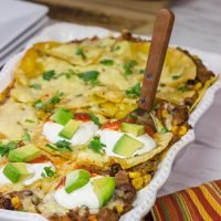 Looking for a fun way to mix up the dinner routine? This Mexican Lasagna features beef chorizo layered between corn tortillas, refried beans and plenty of melted cheese!