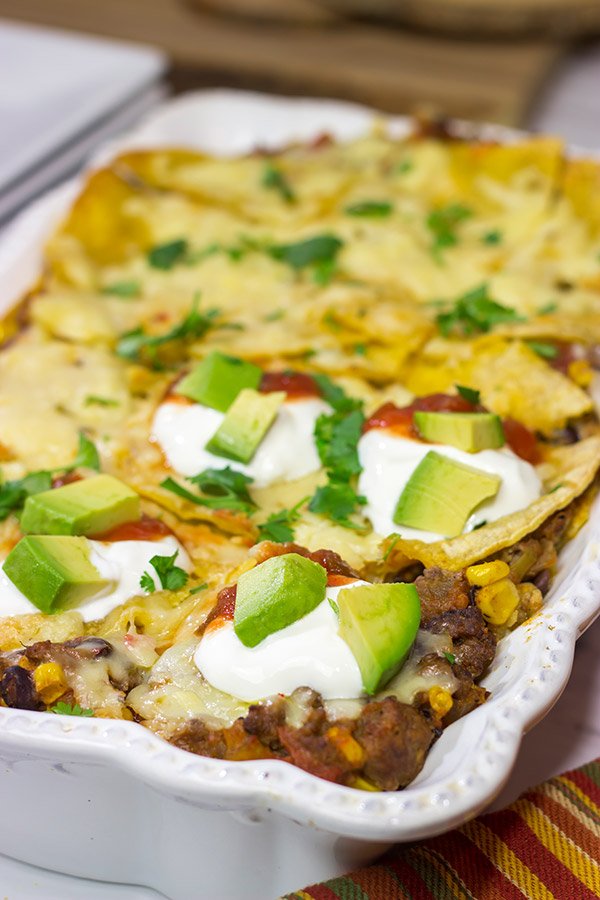 Looking for a fun way to mix up the dinner routine? This Mexican Lasagna features beef chorizo layered between corn tortillas, refried beans and plenty of melted cheese!