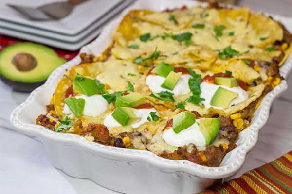 Looking for a fun way to mix up the dinner routine? This Mexican Lasagna features beef chorizo layered between corn tortillas, refried beans and plenty of melted cheese!