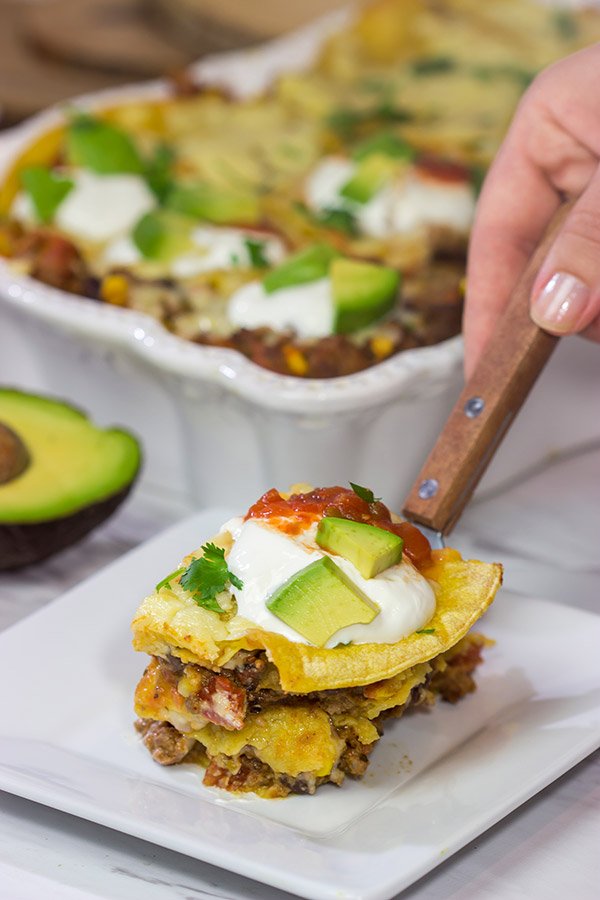 Looking for a fun way to mix up the dinner routine? This Mexican Lasagna features beef chorizo layered between corn tortillas, refried beans and plenty of melted cheese!