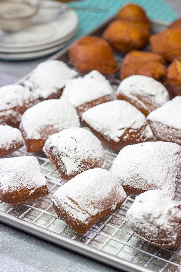 New Orleans Beignets are a classic sweet treat in the Crescent City. Now you can make a batch at home...complete with plenty of powdered sugar!