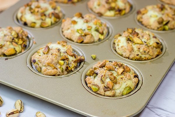These tasty Pistachio Muffins are packed with chopped pistachios...but don't forget about the brown sugar streusel on top!