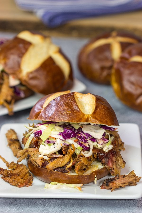 Looking for a fun way to serve pulled pork?  Grab (or make) pretzel rolls and serve up this Pulled Pork on a Pretzel Roll!