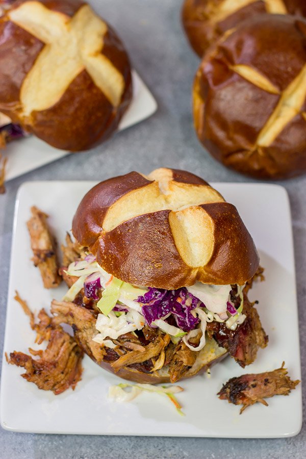 Looking for a fun way to serve pulled pork?  Grab (or make) pretzel rolls and serve up this Pulled Pork on a Pretzel Roll!