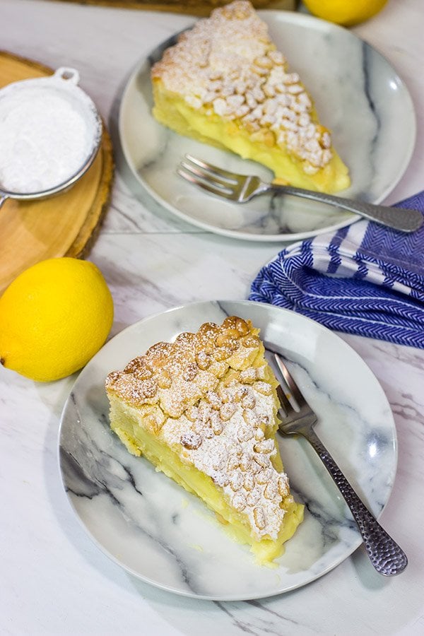 Topped with pine nuts and a dusting of powdered sugar, the Torta della Nonna features a lemon vanilla custard inside of a cookie-like crust. It's delicious!