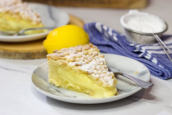 Topped with pine nuts and a dusting of powdered sugar, the Torta della Nonna features a lemon vanilla custard inside of a cookie-like crust. It's delicious!