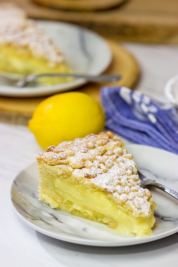 Topped with pine nuts and a dusting of powdered sugar, the Torta della Nonna features a lemon vanilla custard inside of a cookie-like crust. It's delicious!