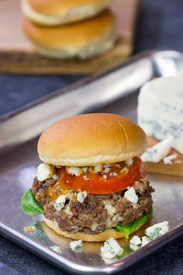 Looking for a fun spin on a classic summer meal?  Grab some blue cheese and buffalo sauce and grill up a batch of these Buffalo Blue Cheese Burgers!