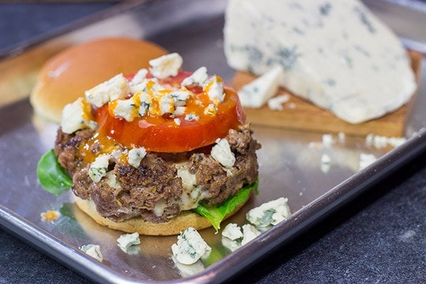 Looking for a fun spin on a classic summer meal?  Grab some blue cheese and buffalo sauce and grill up a batch of these Buffalo Blue Cheese Burgers!