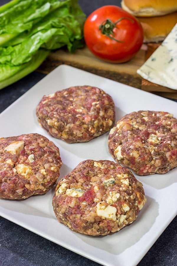 Looking for a fun spin on a classic summer meal?  Grab some blue cheese and buffalo sauce and grill up a batch of these Buffalo Blue Cheese Burgers!