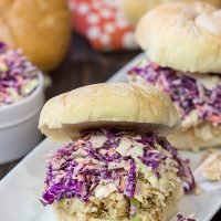 Topped with crunchy coleslaw, these Carolina Style BBQ Shredded Chicken Sandwiches make for a tasty meal!