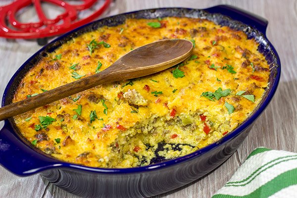 Give grits a chance! Loaded with all sorts of yummy ingredients, this Sausage and Cheese Grits Casserole is a great way to enjoy a lazy brunch or perhaps breakfast for dinner!
